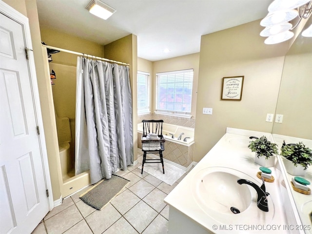 bathroom featuring tile patterned floors, independent shower and bath, and vanity