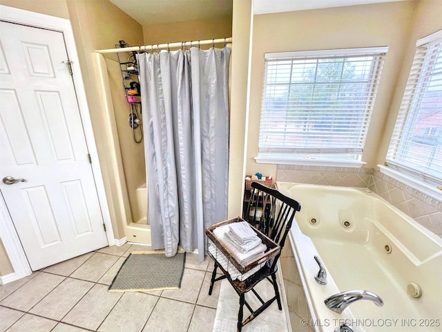 bathroom with tile patterned flooring and walk in shower