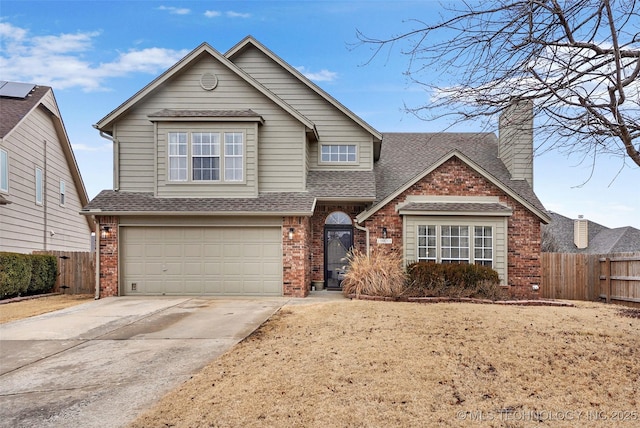 front of property with a garage