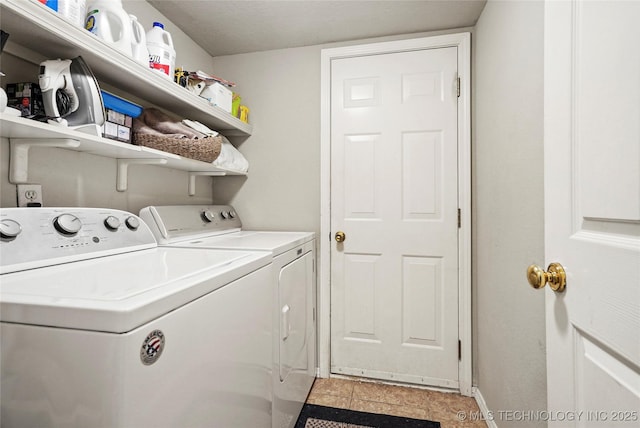 laundry room with washing machine and dryer