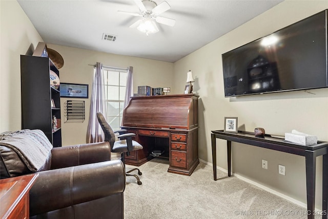 office with ceiling fan and light colored carpet