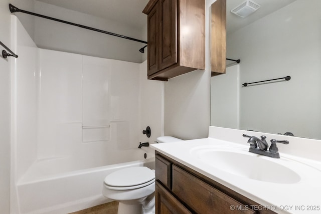 full bathroom with vanity, shower / washtub combination, and toilet