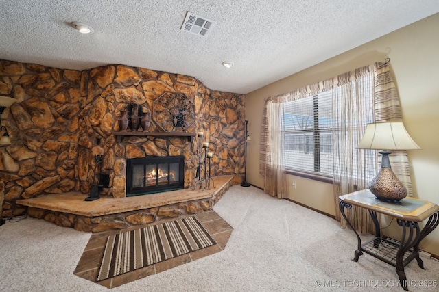 living room featuring light colored carpet, a stone fireplace, vaulted ceiling, and a textured ceiling