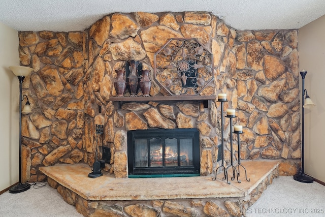 room details featuring a stone fireplace, carpet floors, and a textured ceiling