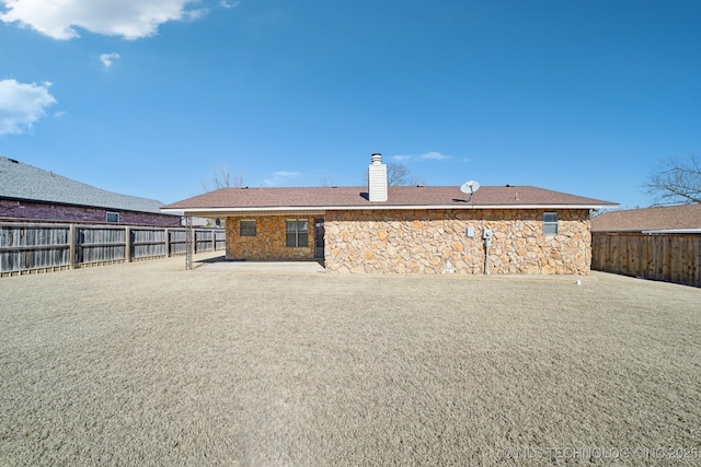 rear view of house with a patio area