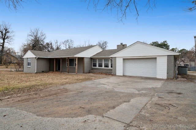 ranch-style home with a garage