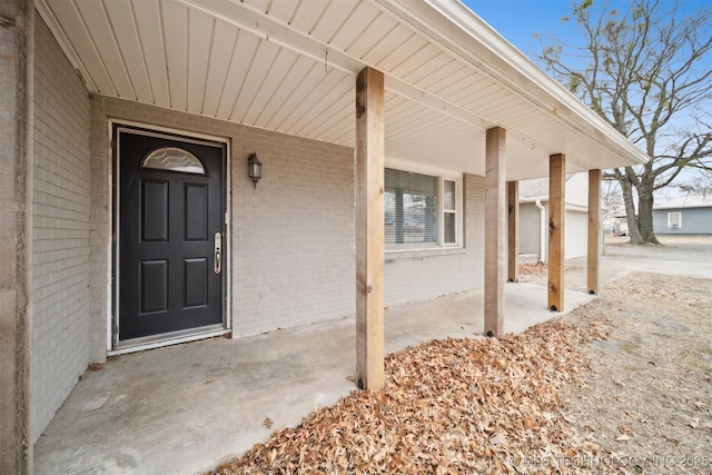 entrance to property with covered porch