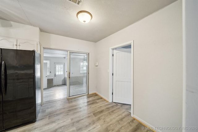 interior space with light hardwood / wood-style flooring