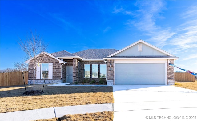 ranch-style home with a garage and a front yard