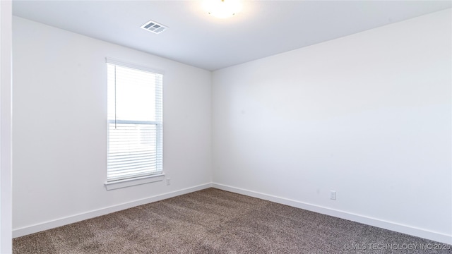 empty room with carpet floors