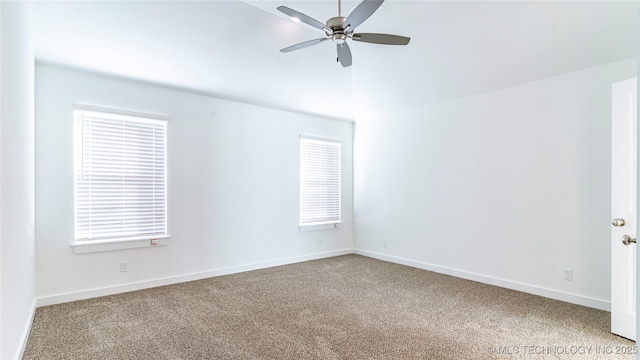 unfurnished room featuring carpet and ceiling fan