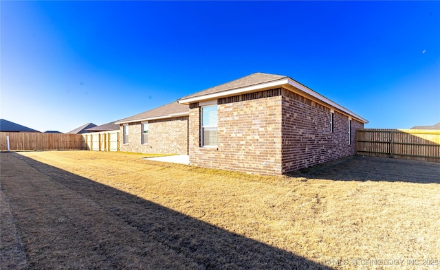 view of home's exterior with a patio area