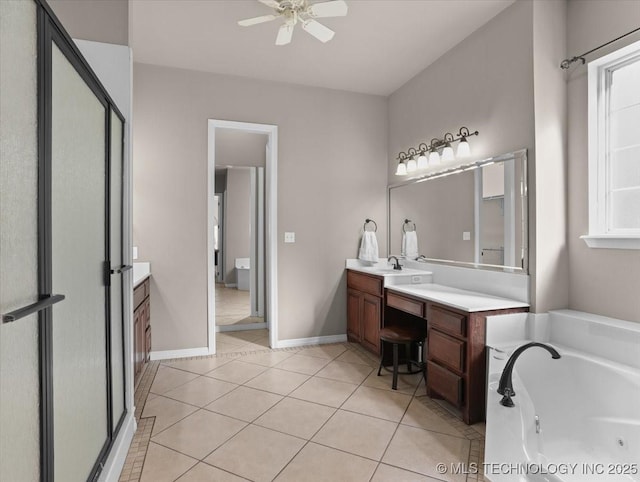 bathroom featuring ceiling fan, tile patterned floors, separate shower and tub, and vanity