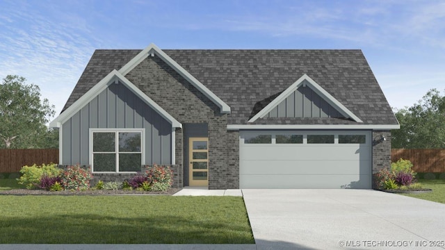 view of front of house with a garage and a front yard