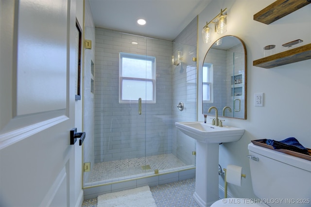 bathroom with walk in shower and toilet