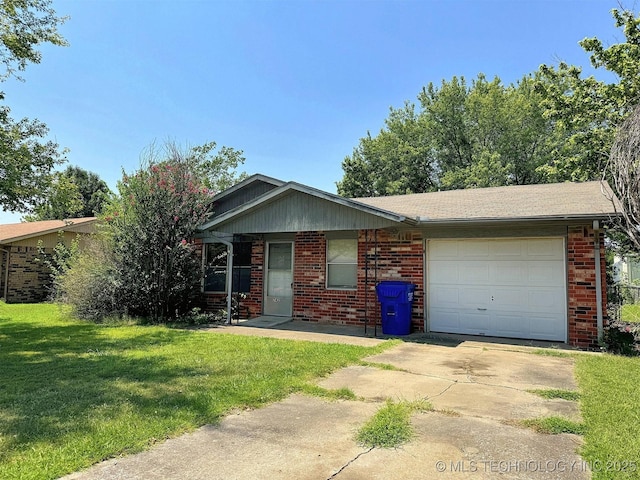 ranch-style home with a garage and a front lawn