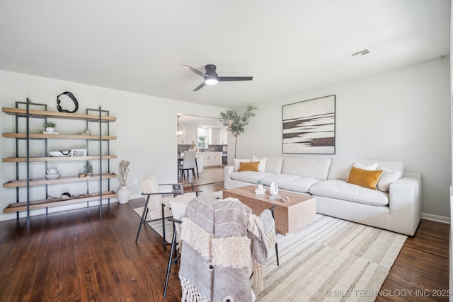 828 N Roosevelt Ave, Sand Springs, OK 74063 - living area with wood finished floors and a ceiling fan