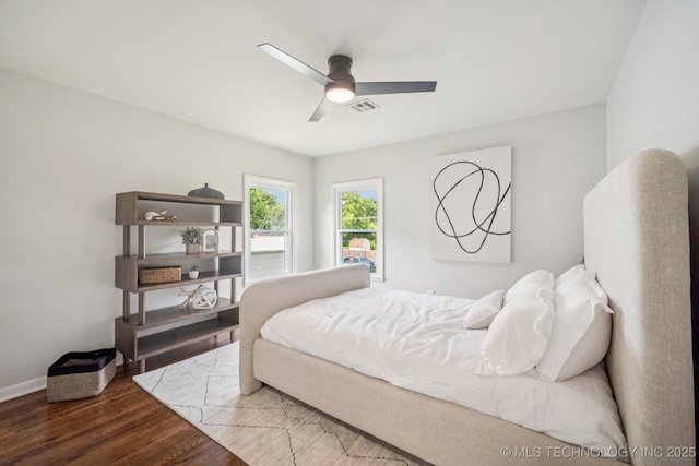 828 N Roosevelt Ave, Sand Springs, OK 74063 - bedroom with wood finished floors, baseboards, and ceiling fan