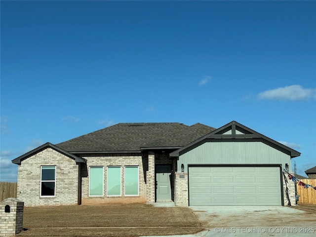 view of front of property featuring a garage