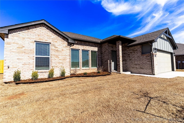 single story home featuring a garage, brick siding, concrete driveway, a front lawn, and board and batten siding