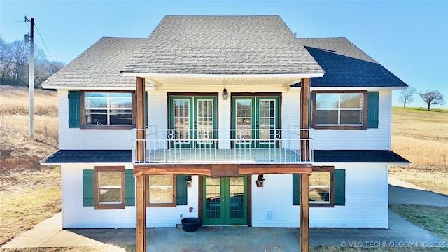 back of property featuring a patio and french doors