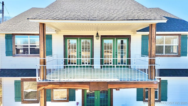 back of house featuring french doors