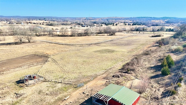 aerial view with a mountain view and a rural view