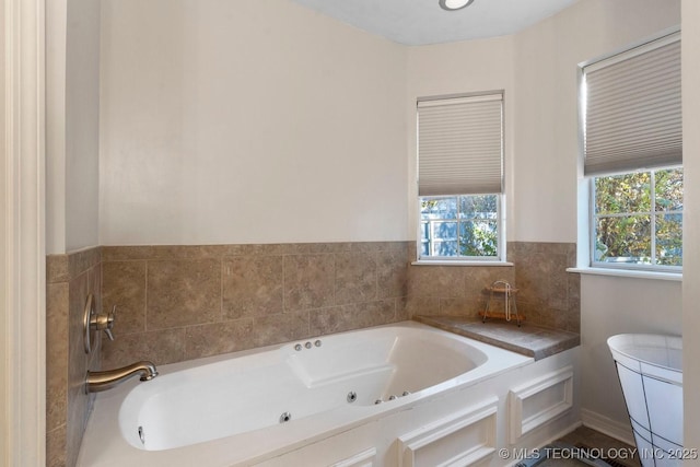 bathroom featuring a washtub