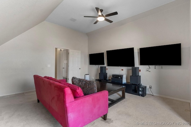 carpeted living room featuring vaulted ceiling and ceiling fan