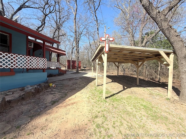view of yard with a detached carport