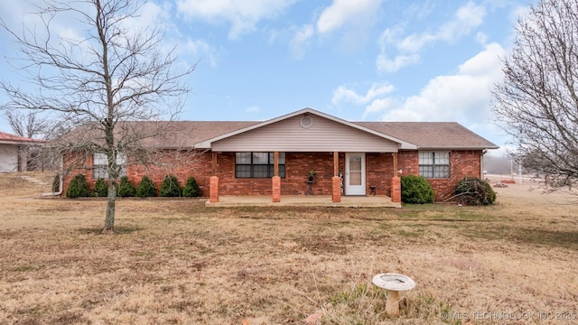 ranch-style home with a front yard