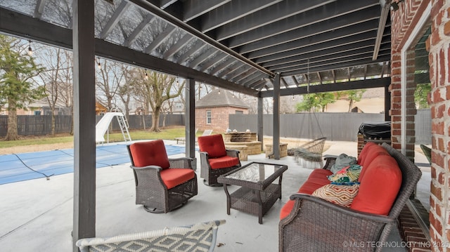 view of patio / terrace with an outdoor hangout area and a pergola