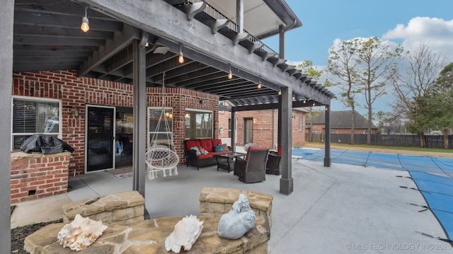 view of patio / terrace with an outdoor living space and a pergola