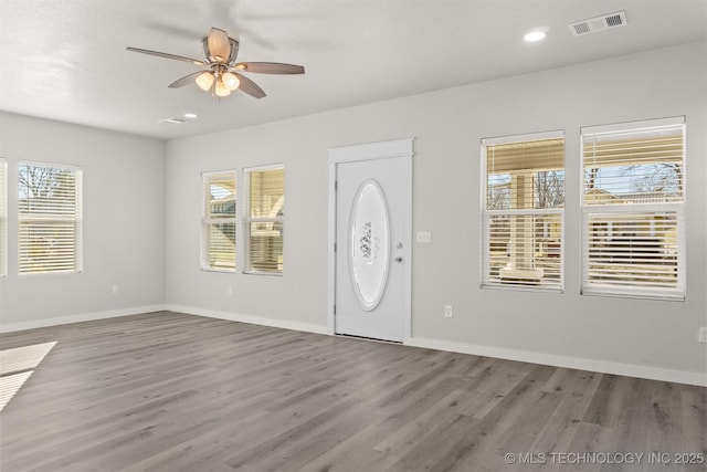 entrance foyer with wood-type flooring and ceiling fan