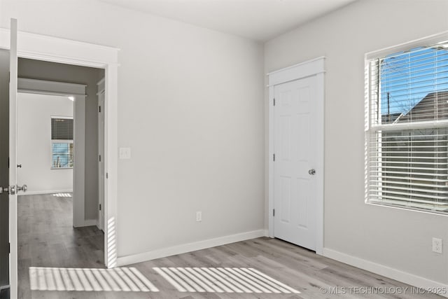 unfurnished bedroom with light hardwood / wood-style floors