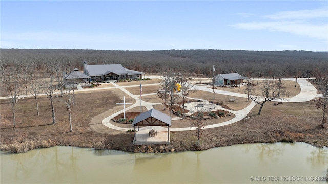 bird's eye view with a water view