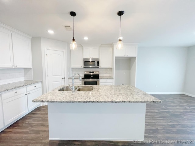 kitchen featuring sink, stainless steel appliances, and white cabinets