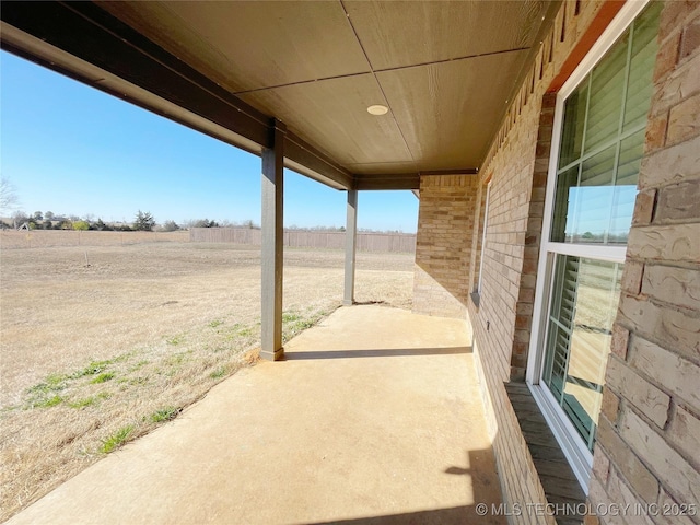 view of patio / terrace with a rural view