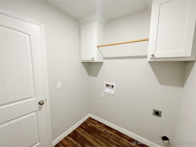 washroom featuring electric dryer hookup, hookup for a washing machine, dark wood-type flooring, and cabinets