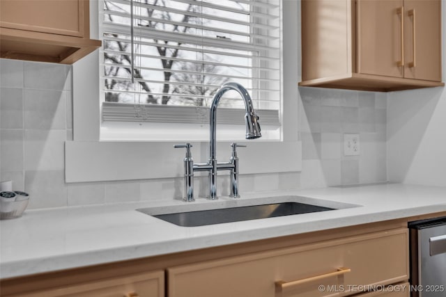 304 E Dallas St, Broken Arrow, OK 74012 - kitchen view of light countertops, tasteful backsplash, and dishwasher