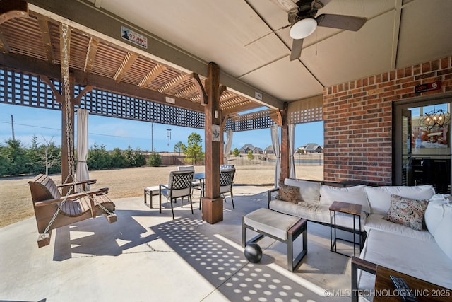 view of patio with an outdoor hangout area, ceiling fan, and a pergola