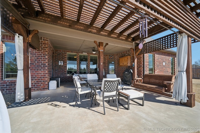 view of patio with outdoor lounge area, ceiling fan, and a pergola