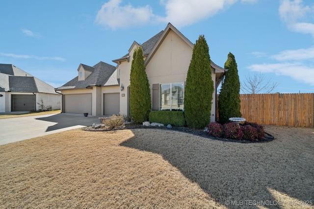 view of front of home with a garage