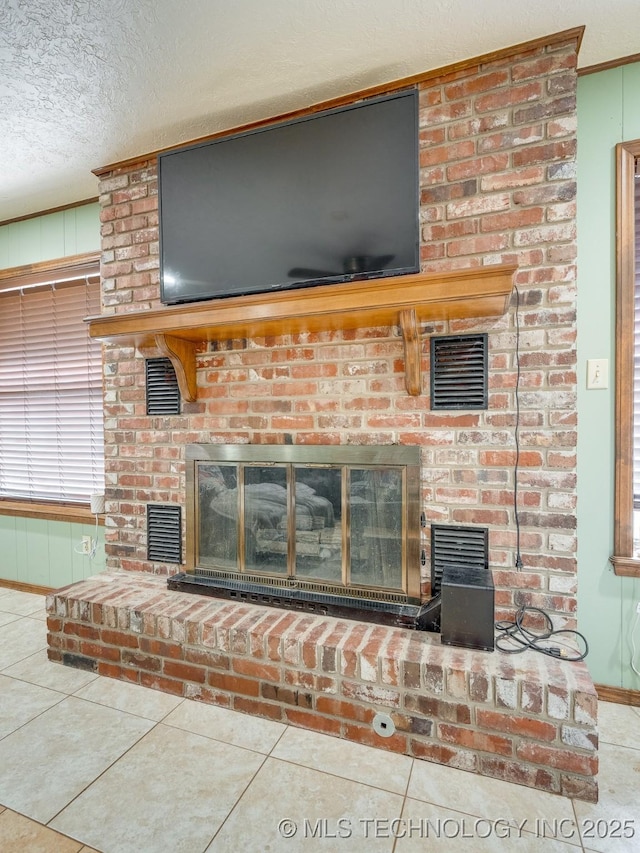 details with crown molding, a fireplace, a textured ceiling, and wood walls