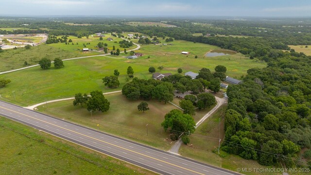 aerial view featuring a water view and a rural view