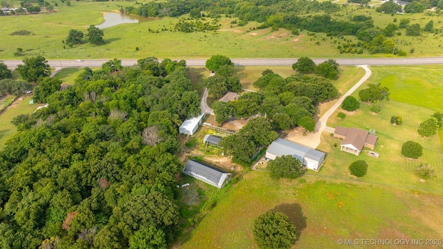 aerial view featuring a water view and a rural view