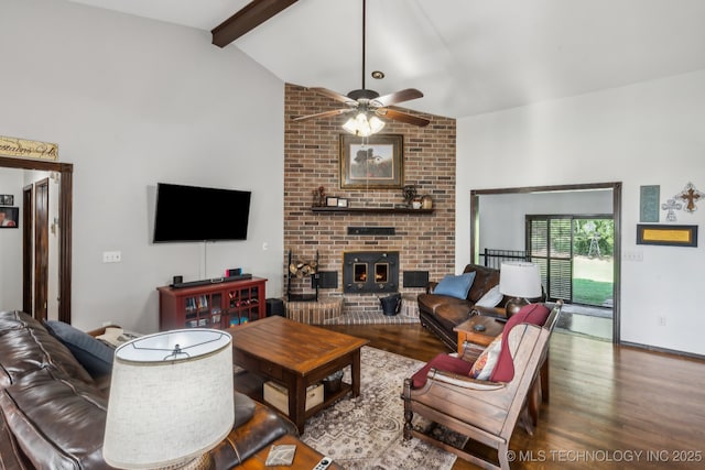 living room with vaulted ceiling with beams, hardwood / wood-style flooring, and ceiling fan