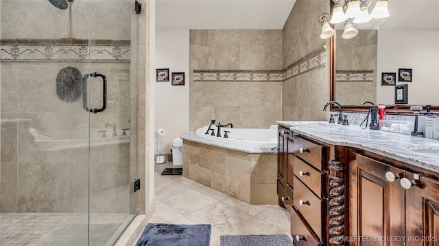 bathroom with vanity, tile patterned flooring, and separate shower and tub