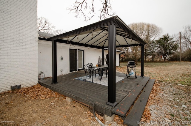 wooden deck with a gazebo