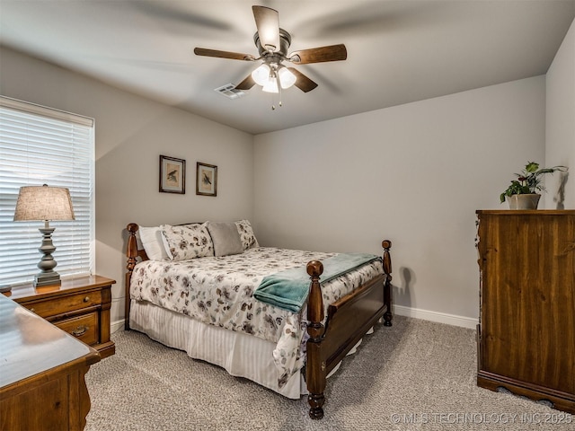 bedroom with light carpet and ceiling fan